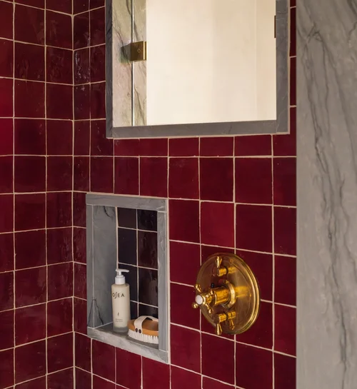 Ruby tiles and unlacquered brass